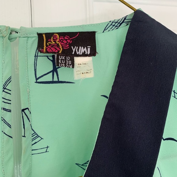 Yumi Peplum Sleeveless Blouse - Picture 5 of 5